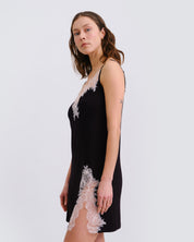 Effetto bamboo chemise spaghetti strap 03162 – women's sleepwear, black
Woman wearing a black slip dress with lace details on a white background