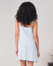 Effetto bamboo chemise spaghetti strap 03162 – women's sleepwear, icy blue
Woman wearing a light blue slip dress against a plain background