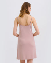Effetto bamboo chemise spaghetti strap 03162 – women's sleepwear, nude rose
Woman wearing a pink slip dress on a white background
