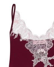 Effetto bamboo camisole pajama set 03163 – women's sleepwear, cherry lacquer

Close-up of a burgundy lace lingerie set with white lace details on a white background.