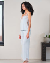 Effetto bamboo camisole pajama set 03163 – women's sleepwear, icy blue
Woman wearing light blue pajama set in a minimalistic room.