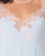 Effetto bamboo camisole pajama set 03163 – women's sleepwear, icy blue
Light blue dress with lace detailing and a pearl necklace.