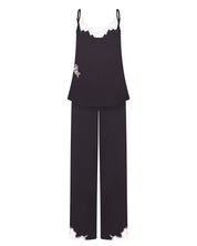 Effetto bamboo camisole pajama set 03163 – women's sleepwear, smoke grey
Black top and pants set with white trim on a white background