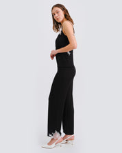 Effetto bamboo camisole pajama set 03163 – women's sleepwear, black
Woman wearing a black sleeveless top and wide-leg pants on a white background