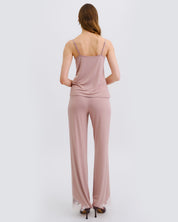 Effetto bamboo camisole pajama set 03163 – women's sleepwear, nude rose
Woman wearing a pink satin jumpsuit on a white background