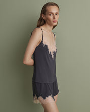 Effetto bamboo cami shorts set 03163 – women's sleepwear, smoke grey
Woman wearing a dark gray nightgown with lace details on a green background
