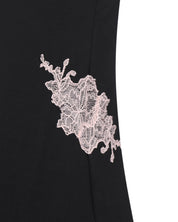 Effetto bamboo cami shorts set 03163 – women's sleepwear, black
Black garment with a white lace flower detail on a white background