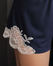 Effetto bamboo cami shorts set 03163 – women's sleepwear, navy blue
Navy blue shorts with white lace trim on a black background